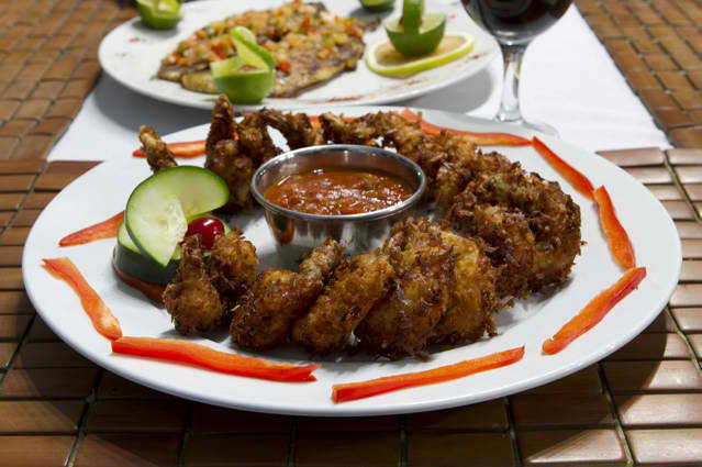 Dining on Coconut Shrimp at Tranquility Bay Resort, Ambergris Caye, Belize