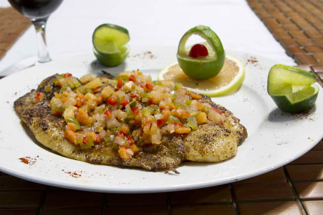 Dining on Blackened Grouper at Tranquility Bay Resort, Ambergris Caye, Belize